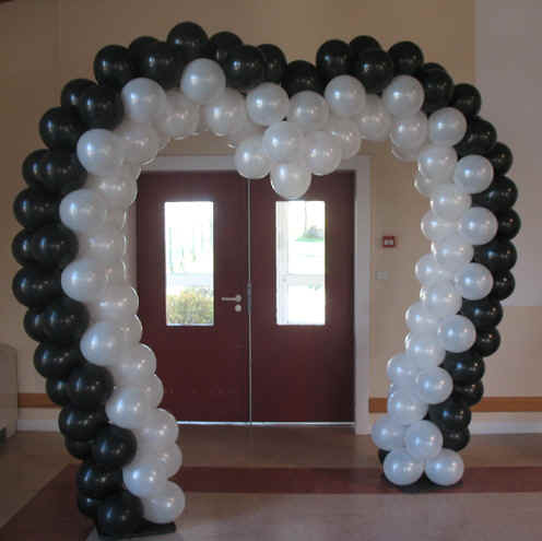 A few examples here below A balloon arch can embellish your wedding and